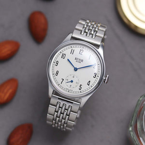 OLD SMITH 90-001 Cream dial with Blue hands and stainless steel bracelet