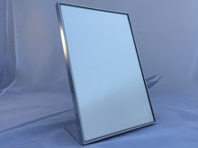 Breitling display mirror with airplane