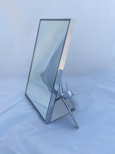 Breitling display mirror with airplane