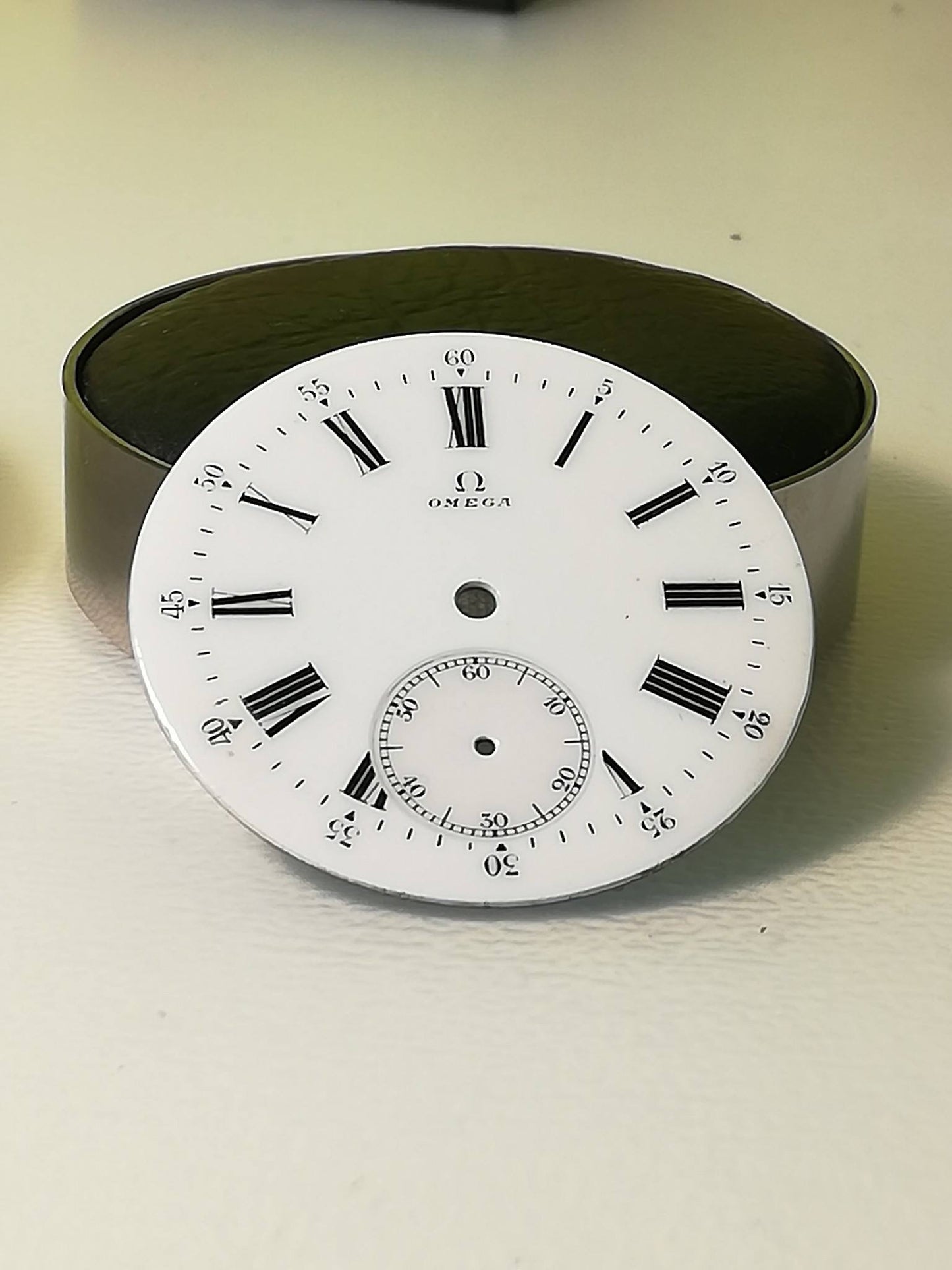 Enamel or painted dial restoration